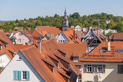 View from above over the roofs of the historic old town of Marbach am Neckar, church tower of the