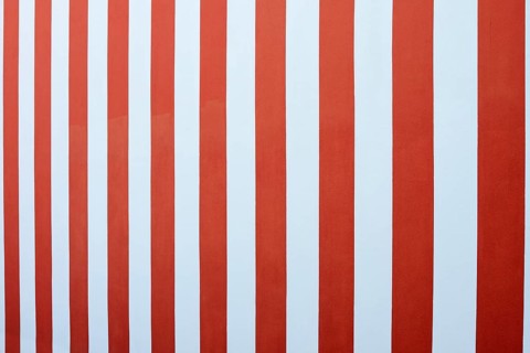 Red and white painted house wall, North Rhine-Westphalia, Germany