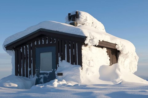 Deep snow-covered hut on Mount Dundret, Gällivare, Norrbotten, Lapland, Sweden