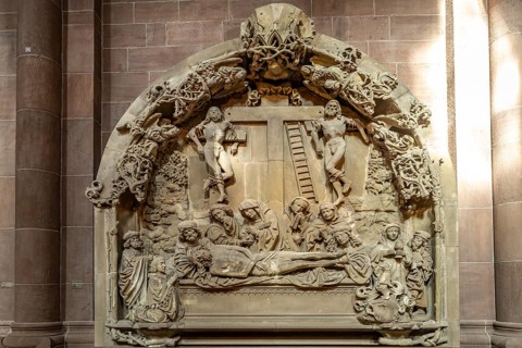 Stone relief of Christ's entombment in the interior of St. Peter's Cathedral in Worms,