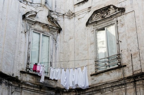 Clothesline between windows of a historic palace, Rione Sanità, Naples, Campania, Italy