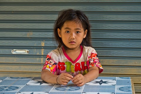 Laotian girl in a Hmong village, Pha Yung, Muang Ngoi on the Nam Ou River, Phongsali Province, Laos