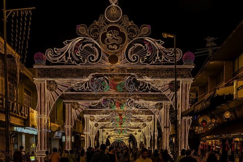 Large trains and luxurious street lighting in a pedestrian zone, night view, old city center,