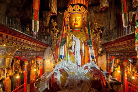 Buddha Maitreya in the rock monastery Drak Yerpa, Central Tibet, Tibet, China