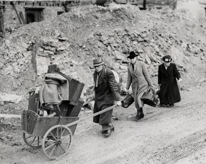 Aachen, escape from the city, ruins, last possession, fear, World War II, Three people with a cart