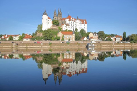 Cityscape and castle hill with Albrechtsburg and cathedral, reflection in the river Elbe, Meissen,