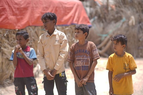 Yemeni children living in a refugee camp under difficult humanitarian conditions. Yemen, April 12,