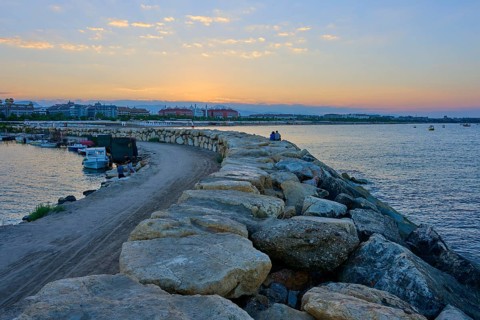 Rocky coast overlooking the sea and a golden sunrise, marina, Evrenseki, Manavgat, Antalya, Turkish