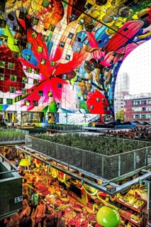 Markthal from 2014, offers over 100 food stalls and delicatessens with spectacular ceiling fresco