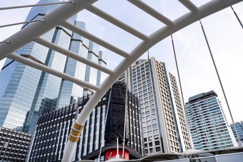 Modern architecture of the public sky walk bridge at Chong Nonsi sky train station, Sathorn Square,