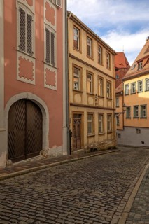 20 August 2026, historic buildings and cobblestone street along Eisgrube lane in the old town of
