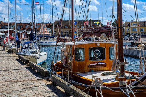 Maritime atmosphere: sports boats and sailing yachts on the quay in Torekov harbour, Skåne, Sweden.