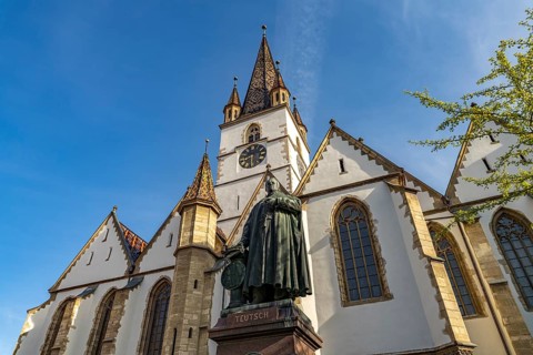 Bishop Teutsch Memorial and the Protestant Town Parish Church in Sibiu or Sibiu, Transylvania,