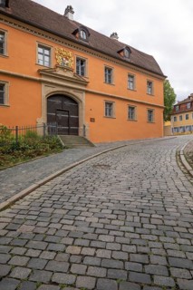 20 August 2026, Exterior view of the historic Haus zur Goldenen Wappe along a cobbled street in