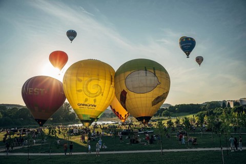 Vilnius, Lithuania, 08 05 2022: Hot air balloons in Vilnius. Multi-colored hot air balloons on the