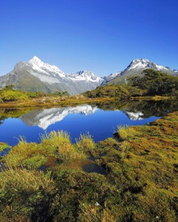 Key Summit with reflection of Mt. Christina, Fjordland National Park, World Heritage Site South