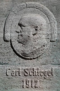 Relief by Carl Schlegel with the date 1912, grey head, Döbeln, Saxony, Germany