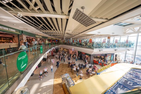 Bright inner area of an airport with shops and lots of people, Airport, Dublin, Ireland