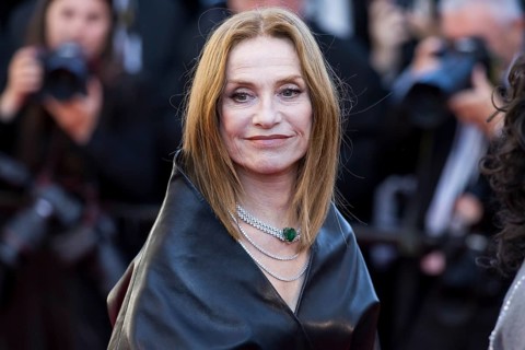 Isabelle Huppert with Karma on the Red Carpet at the Palais des Festivals et des Congrès during the