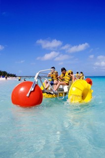 Central America, Caribbean, kids with water buggy, Bahamas