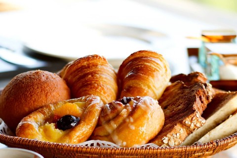 A delicious breakfast with cake and croissants, La Digue, Seychelles, La Digue, Indian Ocean,