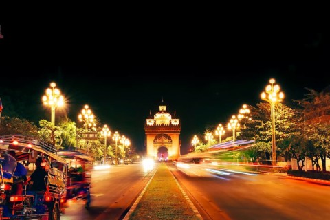 Vientiane, Laos - 15th february, 2025: Lane Xang Avenue and Patuxai Monument in Vientiane. Bright