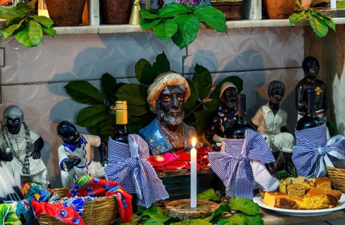A decorated altar in homage to the Old Black Man inside an Umbanda temple, Belo Horizonte, Minas