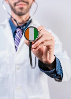 Ivory Coast health and medical insurance concept. Ivory Coast healthcare system, doctor holding