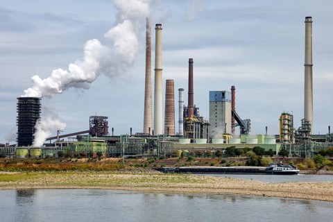 Duisburg, North Rhine-Westphalia, Germany - Low tide on the Rhine. In the back, the Schwelgern KBS