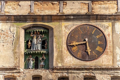 Clock with puppets of the landmark hour tower in Sighisoara or Sighi?oara, Transylvania, Romania