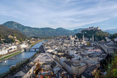 City view with cathedral, Franciscan church and collegiate church of St. Peter, and Salzach, in the