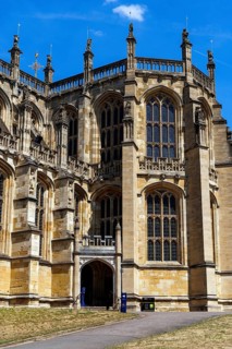 Statue niches and slender pinnacles crown the corner buttresses at St George's Chapel, with a