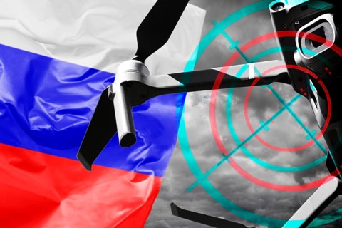 Drone in front of the Russian flag with crosshairs, symbolic photo of Russian drone strikes and