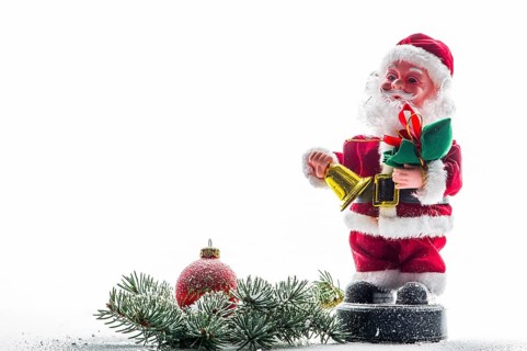 A funny Santa Claus, red Christmas ball, snow, Santa Claus
