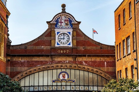 The gabled clock pediment of Windsor Royal Station carries the date 1897, marking the Great Western