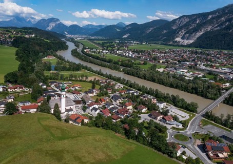 Drone image, view of village with parish church, Breitenbach am Inn, Inntal, Tyrol, Austria