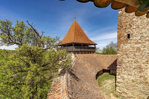 Wehrgang and defensive defence tower of the Saxon fortified church in Viscri or Deutsch-Weisskirch,