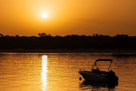 The sun rises on the Spanish Balearic island of Majorca, Colonia de Sant Jordi, Majorca, Spain