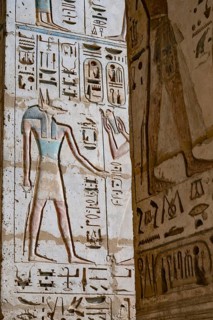Close up details of ancient Egyptian history shown in reliefs and hieroglyphs inside Medinat Habu,