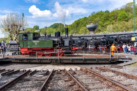 Three-axle steam locomotive Lower Saxony at the Ringlokschuppen with many historic steam
