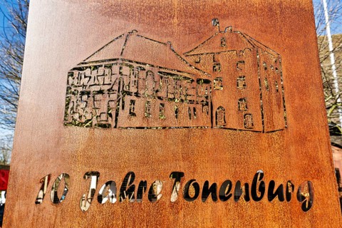 Anniversary, sign made of corten steel, lettering 10 years of Tonenburg, hotel, restaurant,