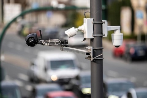 Flir and Vivotek video cameras at a large, busy traffic light intersection, Alfredstraße, B224 and