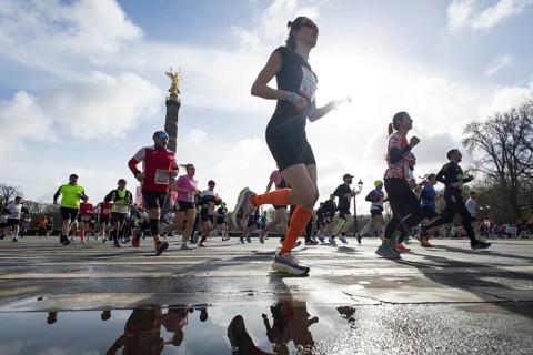 Runners run on the Big Star in front of the Victory Column at the 45th Generali Berlin Half