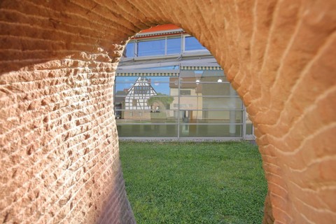 Sculpture Aufbruch by Uta Schade 2007, sandstone, hole, view, view through, detail, reflection,