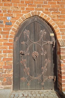 Church door with fittings, brick church built 14th century, brick building, hospital, St. Georg