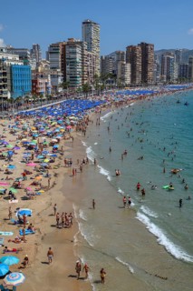 Many tourists on the beach in front of skyscrapers, Playa Levante, Benidorm, Alicante province,