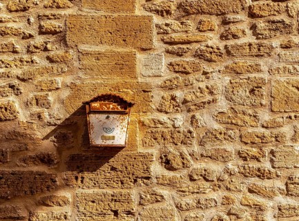 Detail photo, rusty, old letterbox on the facade of a house, Alcudia, Majorca, Spain