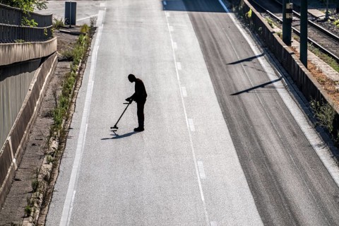 Employees of a road construction company use so-called road radar, ground penetrating radar, GPR,