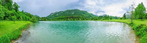 Landscape of Lake Elisabethsee on a rainy day in spring, Austria