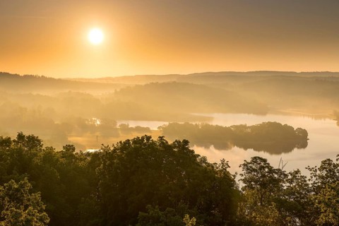View from Julius-Mosen Tower of Pöhl Reservoir at sunrise with morning fog, Vogtland, Saxony,